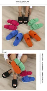 High-quality detail view of colorful plush open-toe slippers with thick soles on a model