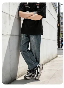 Detailed shot of men's platform chunky sneakers worn in a stylish urban street setting