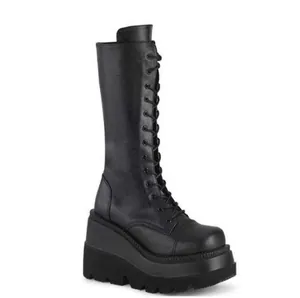 Gothic women's black platform knee-high boots with thick lace-up design and chunky sole