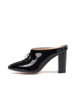 Elegant black patent leather pointed toe mules with chunky high heels and pearl charm detail