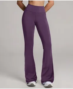 Close-up view of purple high-waisted flared yoga pants with butt-lifting design