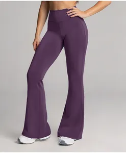 Macro view of high waisted purple flared yoga pants designed for athletic and casual wear