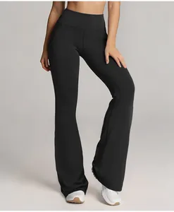 High-waisted black flare yoga pants showing the slimming athletic fit and stylish silhouette.