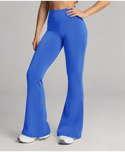 High-waisted blue flared yoga pants for women, vibrant cloud-feel sports trousers detail.