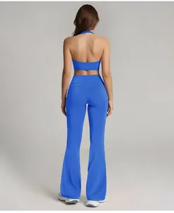 Detailed back view of a blue high-waisted yoga set with flare leggings and halter top