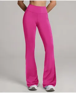 High-waisted hot pink flared yoga pants featuring soft elastic cloud-feeling sports fabric