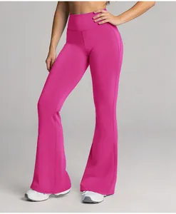 Close-up detail of hot pink high-waisted flare yoga pants for women's fitness training