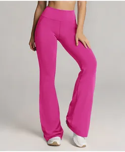 Close-up detail of vibrant pink high-waisted flare yoga pants with butt-lifting design.