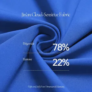 Macro view of soft blue cloud-sensitive fabric for high-waisted flared sports pants.