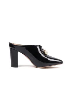 Elegant side profile view of a black patent leather block heel mule with pearl decor