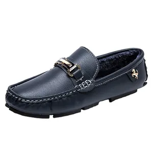 Men's navy blue faux leather slip-on loafers with warm plush lining and gold buckle detail