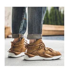 Close-up of brown high-top casual sneakers with decorative rope laces and thick soles