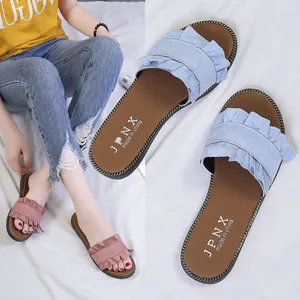 Casual summer flat sandals featuring feminine ruffled wood-ear edge in blue and pink colors