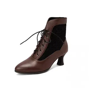 Detailed side view of dark brown Victorian style lace-up ankle boots with kitten heels and lace