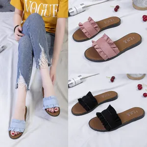 Detailed display of summer ruffled flat slippers for women in blue, pink, and black colors