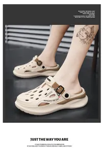 Detailed view of beige men's breathable clogs featuring an adjustable brown buckle strap
