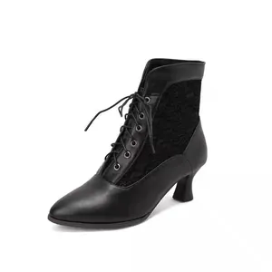 Victorian style black lace-up ankle boot featuring a pointed toe and elegant mid-heel