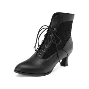 Side view of Victorian style black lace-up ankle boots with elegant floral lace panels.