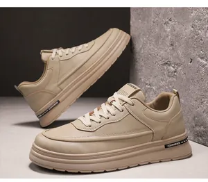 Detailed close-up showing the side profile of beige leather men's casual sneakers in Harajuku style