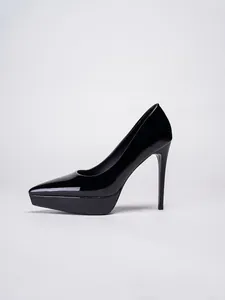 Profile view of black patent leather pointed toe platform stiletto high heels