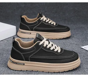 Side view of black and beige Japanese Harajuku style leather sneakers for men.