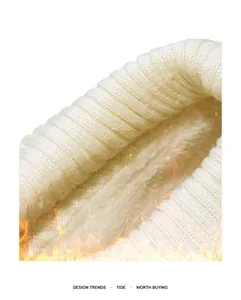 Close-up detail of thick thermal fleece lining and ribbed knit cuff on winter slippers