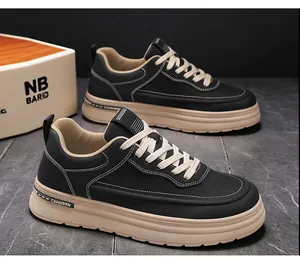 Japanese style men's black platform sneakers with beige laces and contrast stitching