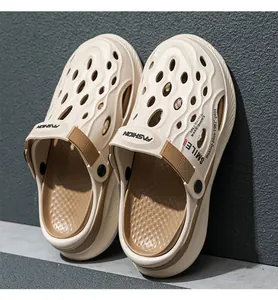 Detailed macro shot of breathable beige clogs for men with stylish side lettering design
