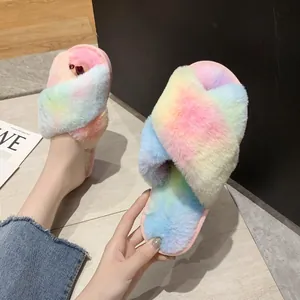Detail view of colorful rainbow faux fur cross-strap slippers for indoor home wear