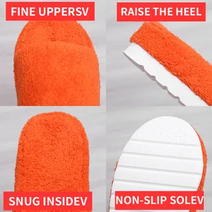 Close-up of orange towel platform slippers with non-slip sole and raised heel details.