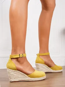 Yellow suede espadrille wedge sandals with braided straw sole and ankle strap