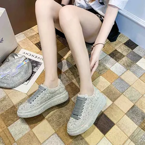 Sparkling rhinestone platform sneakers for women in a stylish lifestyle setting