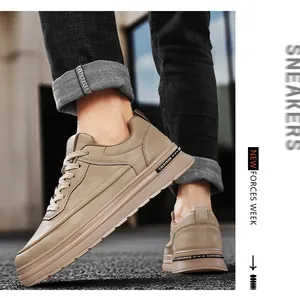 Close-up side view of men's khaki leather casual sneakers with thick platform soles