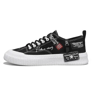 Classic black men's thick sole canvas sneakers with decorative patches and white laces