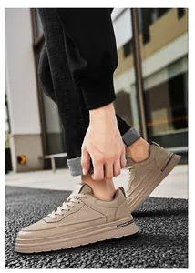 Close-up detail of beige Harajuku style leather men's sport casual workwear shoes