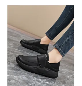 Side view of black non-slip leather work shoes for women in professional kitchen settings