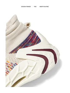 Close-up detail of a cream flying weave sock sneaker with colorful knit accents.