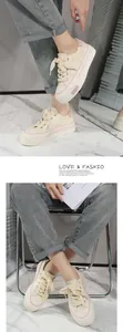 Close-up of stylish beige platform canvas sneakers for women's daily casual fashion wear