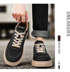 Close-up of men's black leather sneakers with khaki sole in casual Harajuku style