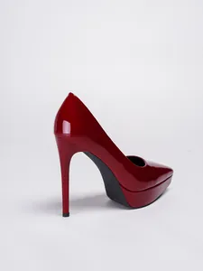 Side view of red patent leather platform stiletto pump with high heel