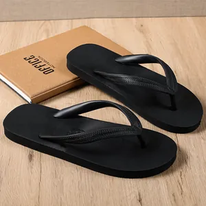 Durable men's black rubber flip-flops for summer beach and outdoor leisure use