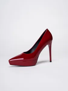 Side view of elegant red patent leather platform stiletto high heels with pointed toe