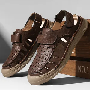 Stylish brown men's breathable hollow outdoor sandals with adjustable velcro straps