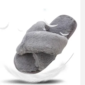 Comfy grey faux fur cross strap slippers for women with soft non-slip sole for indoor use