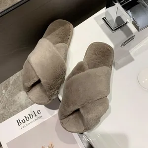 Cozy cross-strap plush slippers for women in neutral taupe faux fur