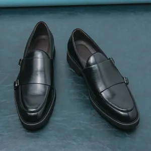 Zwarte herenschoenen met dubbele gesp en dikke platformzool voor formele zakelijke gelegenheden.