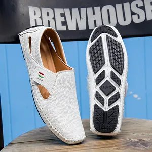 White leather slip-on loafers for men with breathable hollow design and durable sole