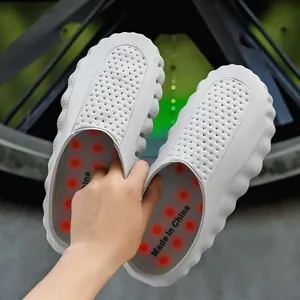 Lightweight gray soft-sole clogs with perforated design for summer outdoor wear.