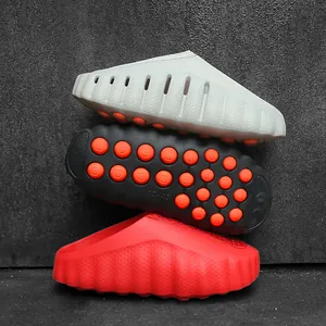 Minimalist bubble-sole slides in grey, black and red for stylish indoor and outdoor wear