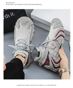 Close-up detail of grey flyknit sock sneakers with multi-color knit accents